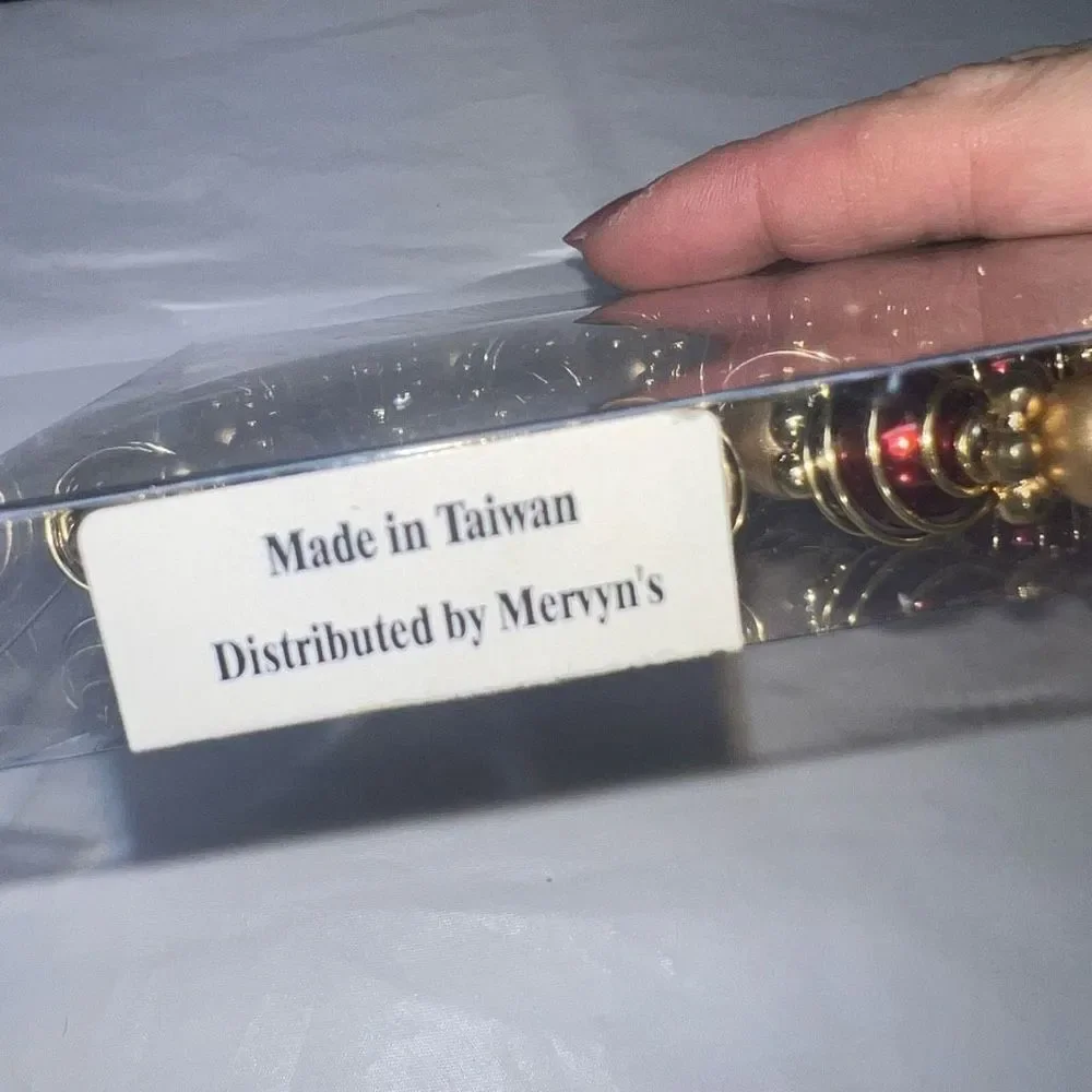 Set of Four Gold and Red Beaded Napkin Holders